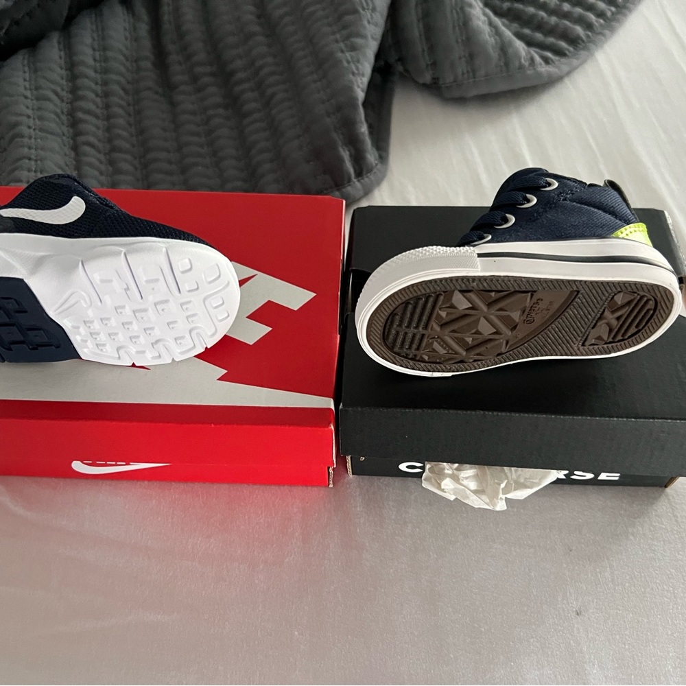 Two pairs of kids size 2 sneakers brand new never worn Nike and converse